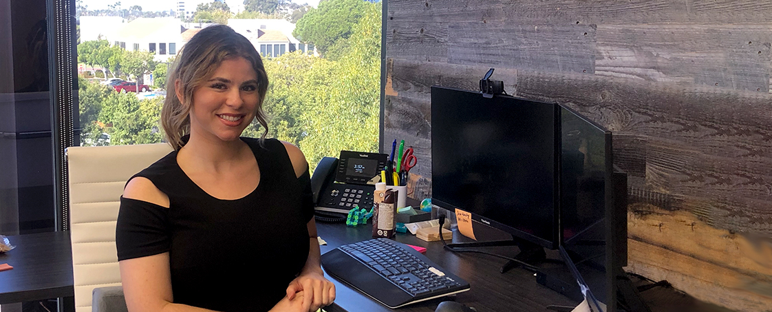 Isabelle Valdez at her desk