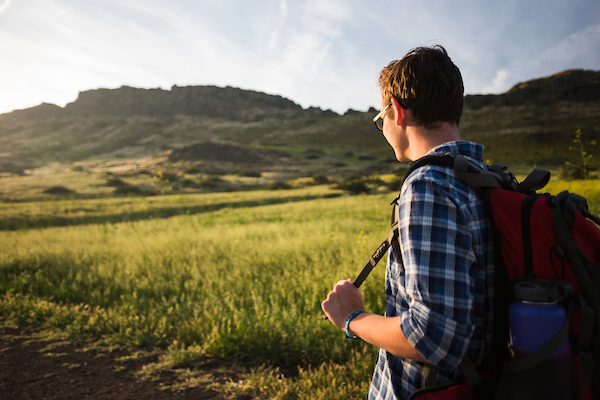 Student hiking on Mount Clef